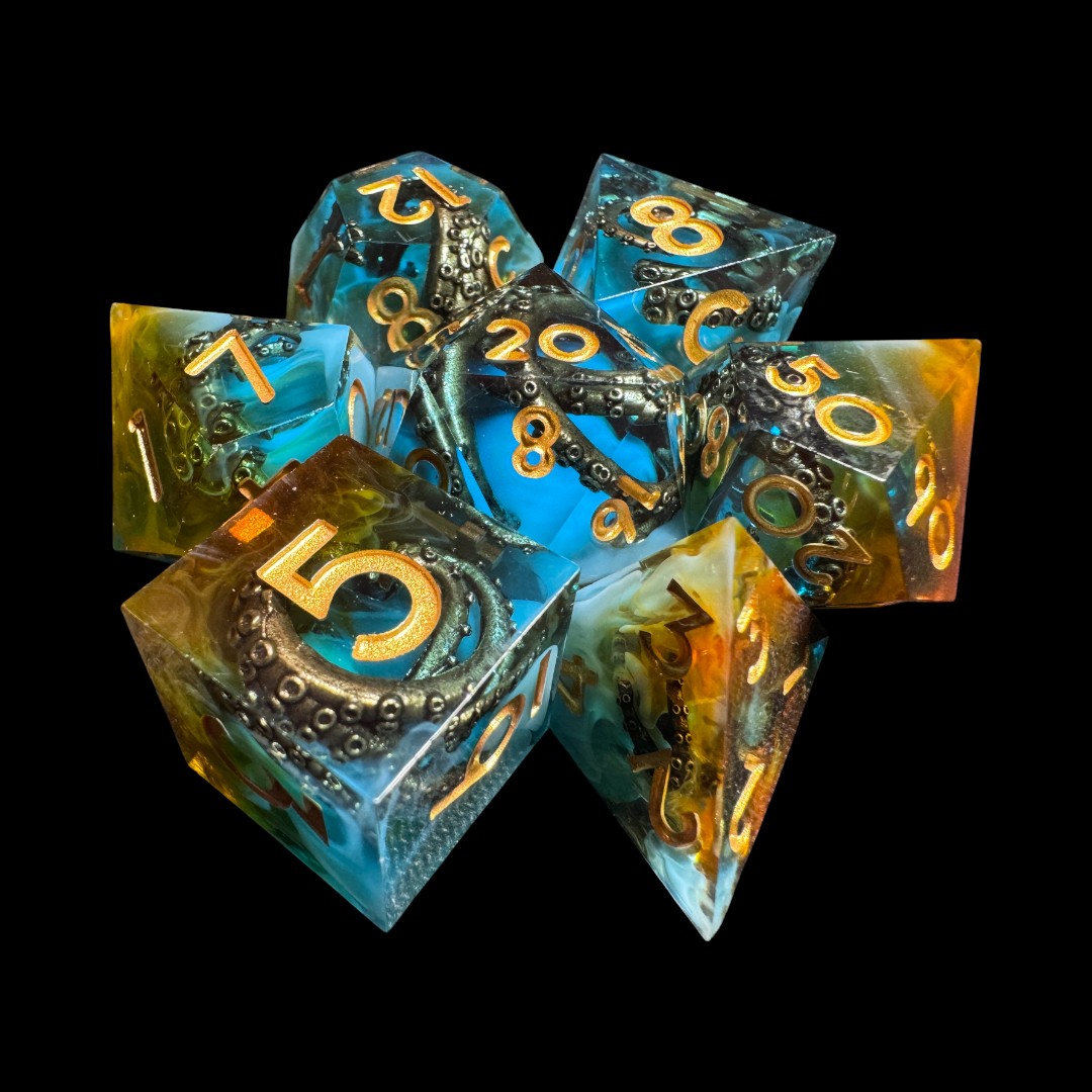 Dadi spigolo vivo trasparente blu+oro con tentacoli